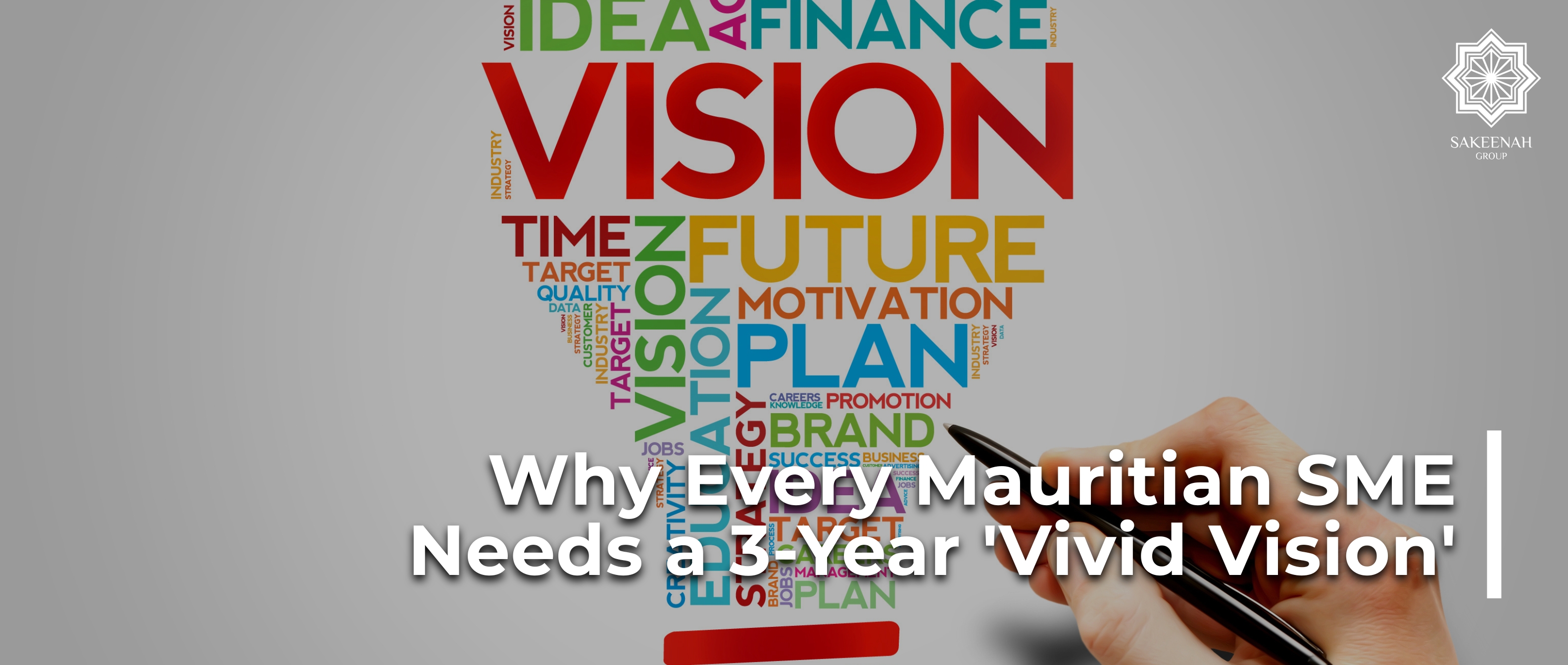 A conceptual word cloud in the shape of a lightbulb against a grey background, featuring prominent business-related words such as 'VISION','FUTURE','PLAN','TIME' and 'MOTIVATION.' A hand on the bottom right holds a black pen, appearing to write or point toward the word cloud. Superimposed on the lower half is the white text, 'Why Every Mauritian SME Needs a 3-Year Vivid Vision. The top-right corner features a logo for 'SAKEENAH GROUP'.